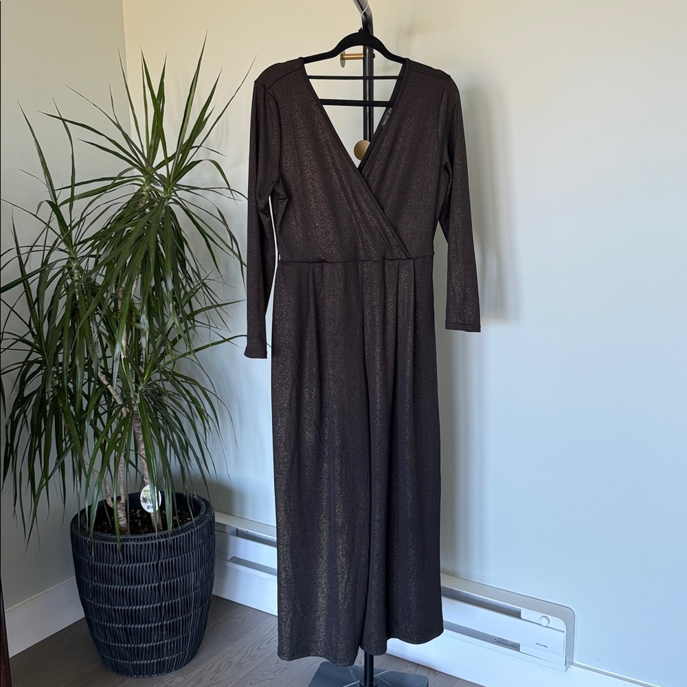 Rachel Zoe Gorgeous Black Jumpsuit with a shimmer of gold, size medium.